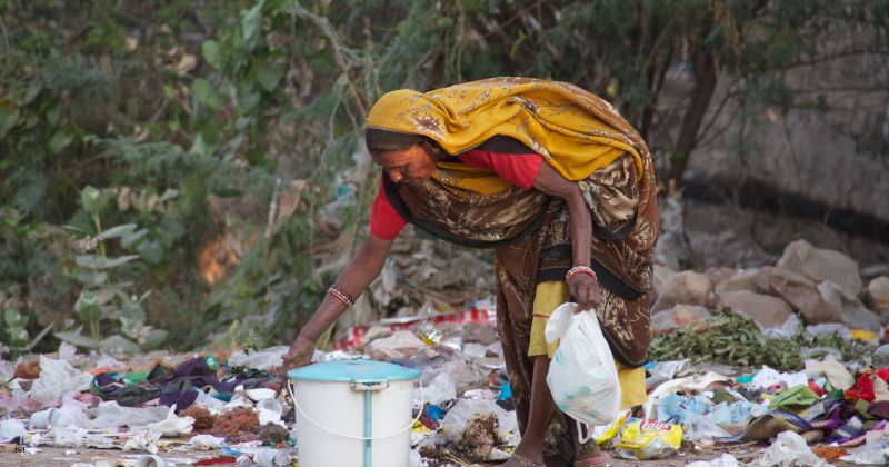 Municipality worker collecting trash | Vicharoo