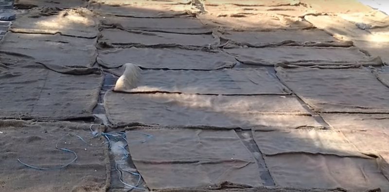 Water jute gunny bags to keep your roof cool